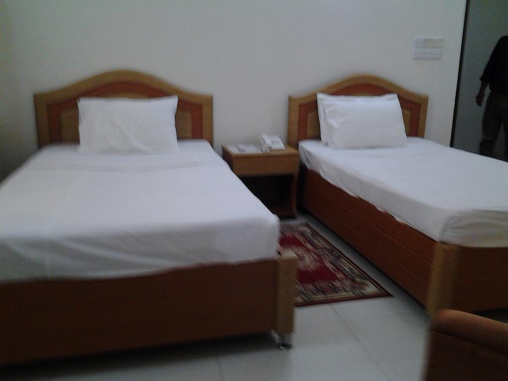 Hotel Afford Inn Ντάκα Δωμάτιο φωτογραφία
